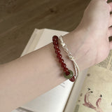 Red Agate & Jadeite Running Ring Bracelet — A Loose Green Ring on a Red Strand - 8mm with Running RingTibet Art