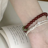Red Agate & Jadeite Running Ring Bracelet — A Loose Green Ring on a Red Strand - 8mm with Running RingTibet Art