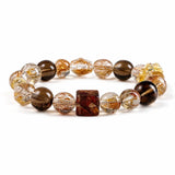 Black Gold Super Seven Crystal Bracelet — Premium Rutilated Quartz Tibet Art