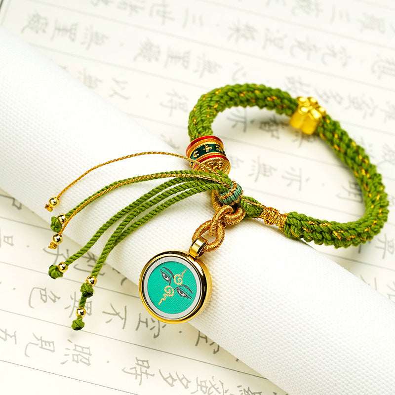 Tibetan Fortune Eye Braided Bracelet — Woven Lucky Cord with Dharma Eye Charm & Prayer Wheel Bead Tibet Art