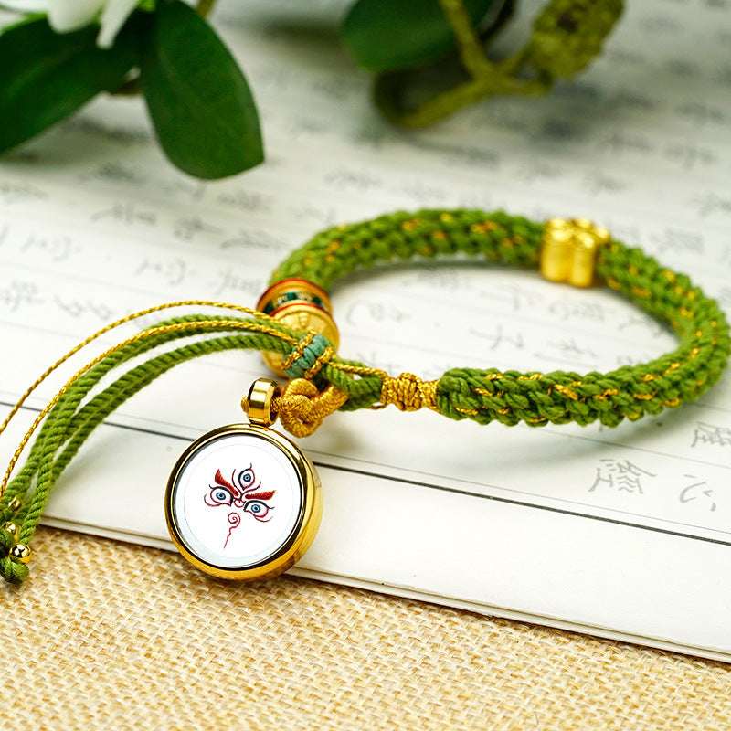 Tibetan Fortune Eye Braided Bracelet — Woven Lucky Cord with Dharma Eye Charm & Prayer Wheel Bead Tibet Art
