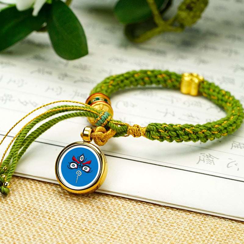 Tibetan Fortune Eye Braided Bracelet — Woven Lucky Cord with Dharma Eye Charm & Prayer Wheel Bead Tibet Art