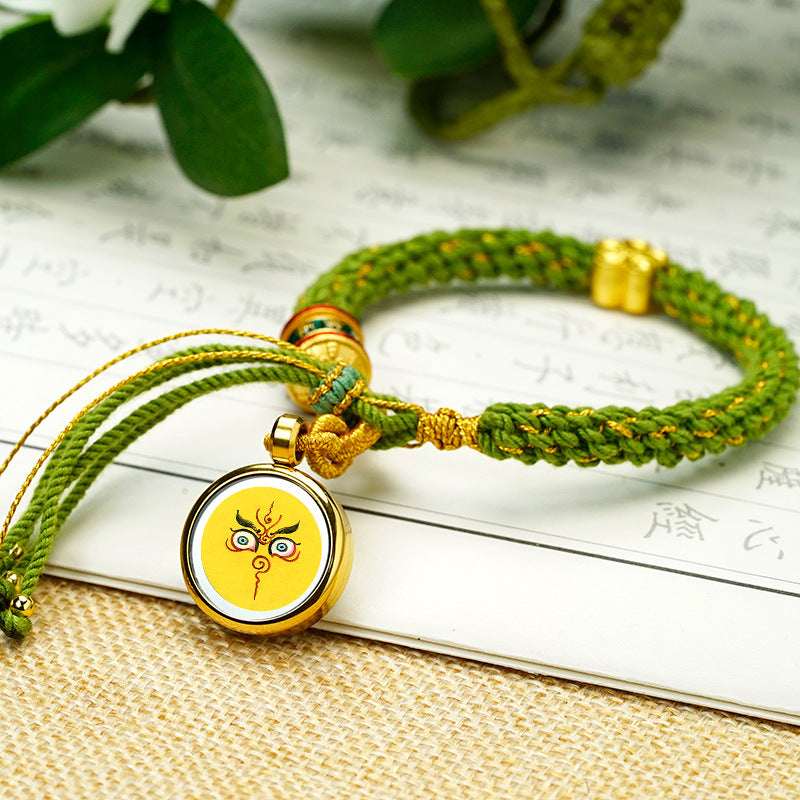Tibetan Fortune Eye Braided Bracelet — Woven Lucky Cord with Dharma Eye Charm & Prayer Wheel Bead Tibet Art