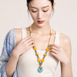 tibetan-white-turquoise-tone-pendant-necklace-model-b-outfit-b-fashion-02