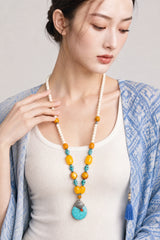 tibetan-white-turquoise-tone-pendant-necklace-model-b-outfit-b-fashion-03