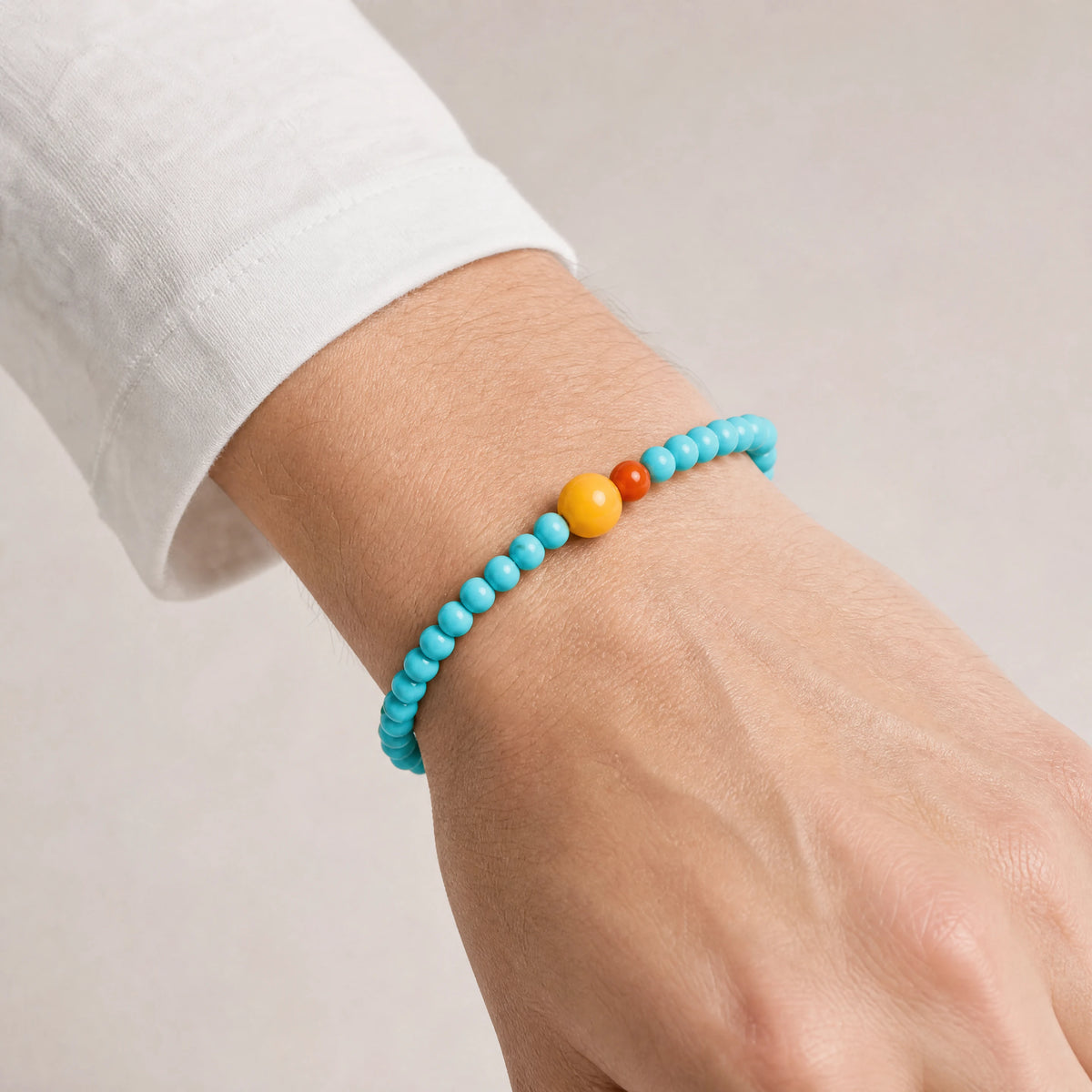 turquoise-3mm-bead-bracelet-model-a-outfit-a-closeup-01