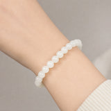 white-jade-bracelet-calm-harmony-model-a-outfit-a-closeup-01