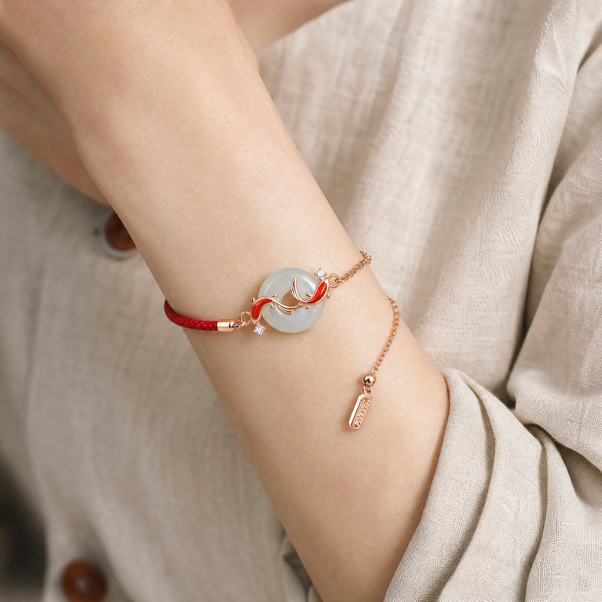white-jade-koi-red-cord-bracelet-model-a-outfit-a-closeup-01