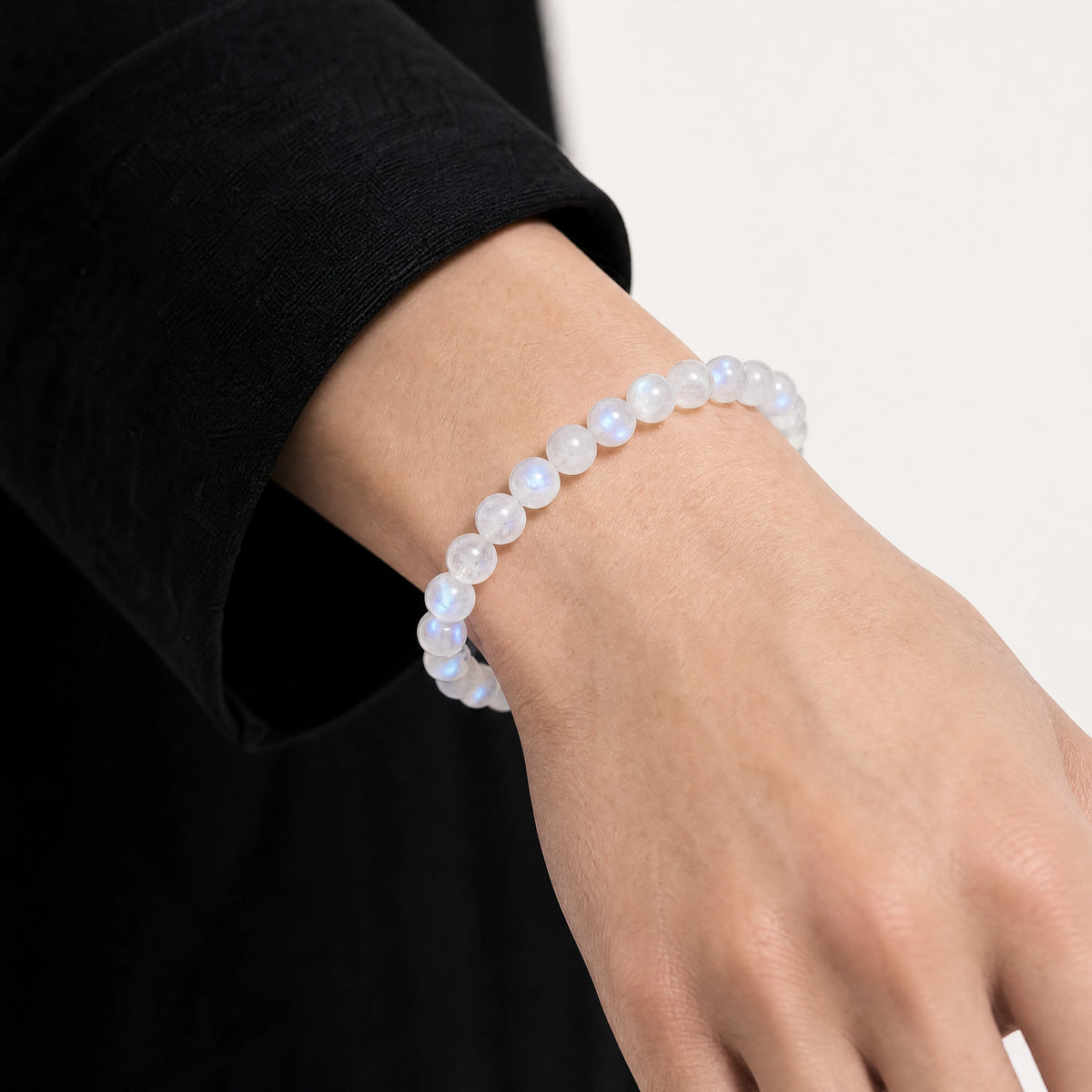 white-moonstone-bead-bracelet-model-a-outfit-a-closeup-01