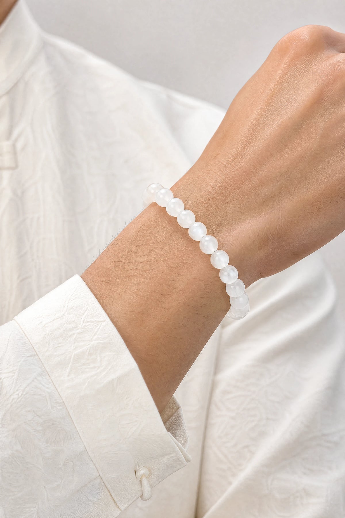 white-moonstone-round-bead-bracelet-model-a-outfit-a-closeup-01