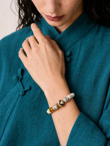 white-yak-bone-tiger-tooth-dzi-bracelet-10mm-model-b-outfit-b-fashion-01