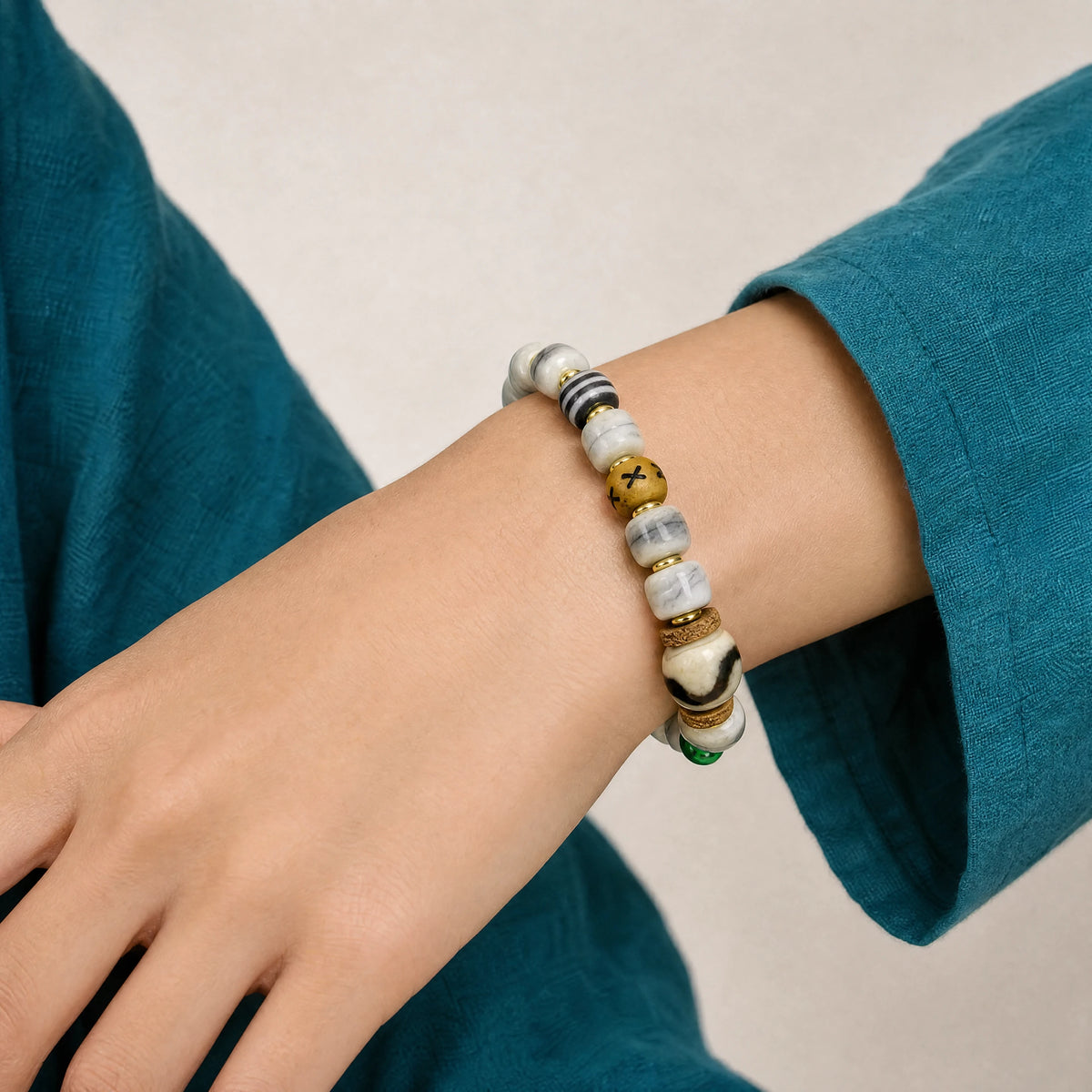white-yak-bone-tiger-tooth-dzi-bracelet-10mm-model-b-outfit-b-fashion-02