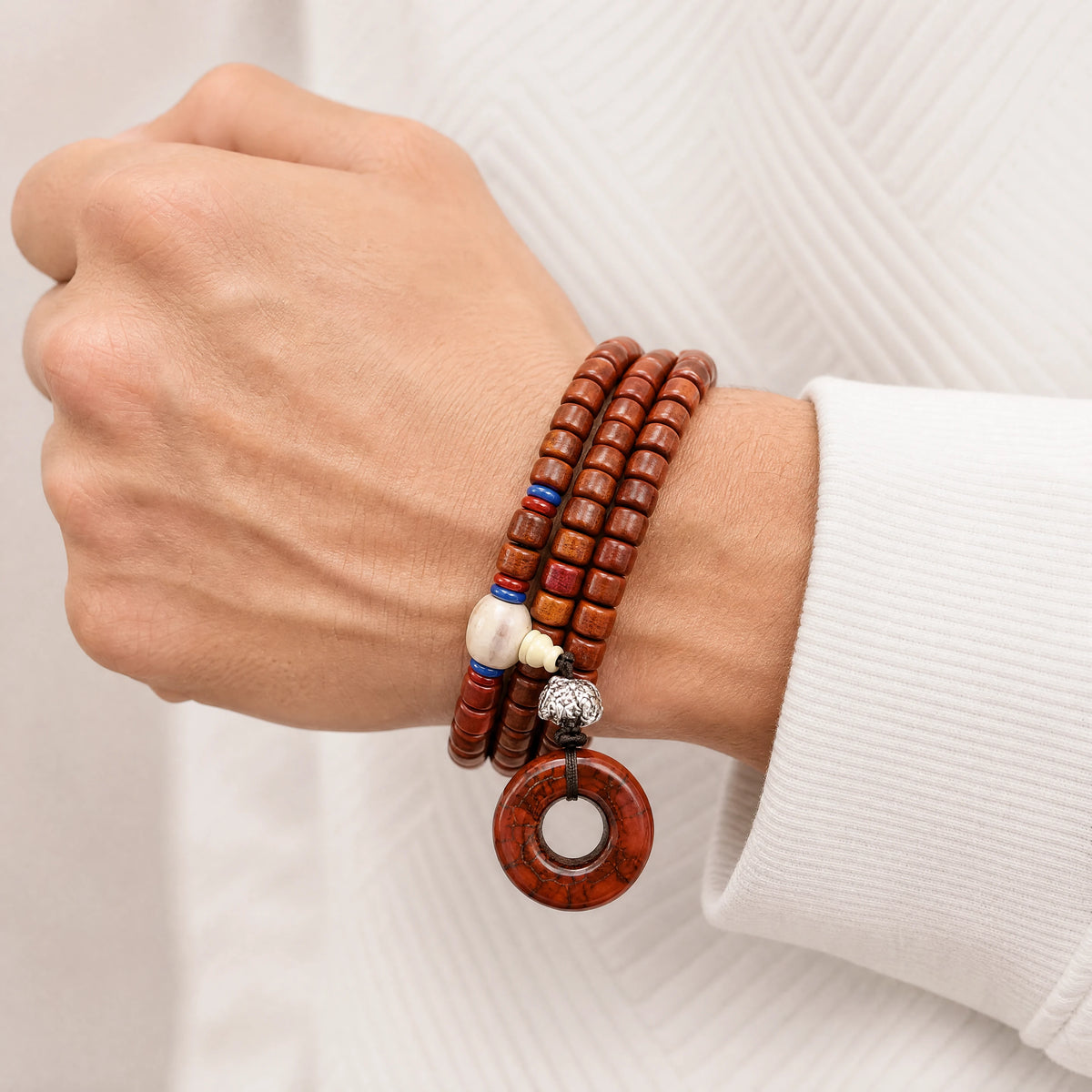 yak-bone-108-mala-peace-buckle-model-a-outfit-a-closeup-01