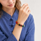 yak-bone-auspicious-symbol-treasure-bracelet-model-b-outfit-b-fashion-01