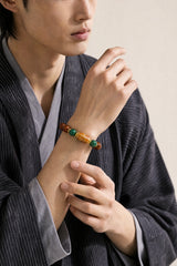 yak-bone-benefactor-dzi-bracelet-10mm-model-a-outfit-a-fashion-01