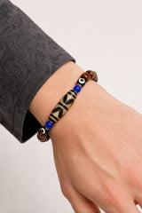 yak-bone-double-tiger-tooth-dzi-bracelet-model-a-outfit-a-closeup-01