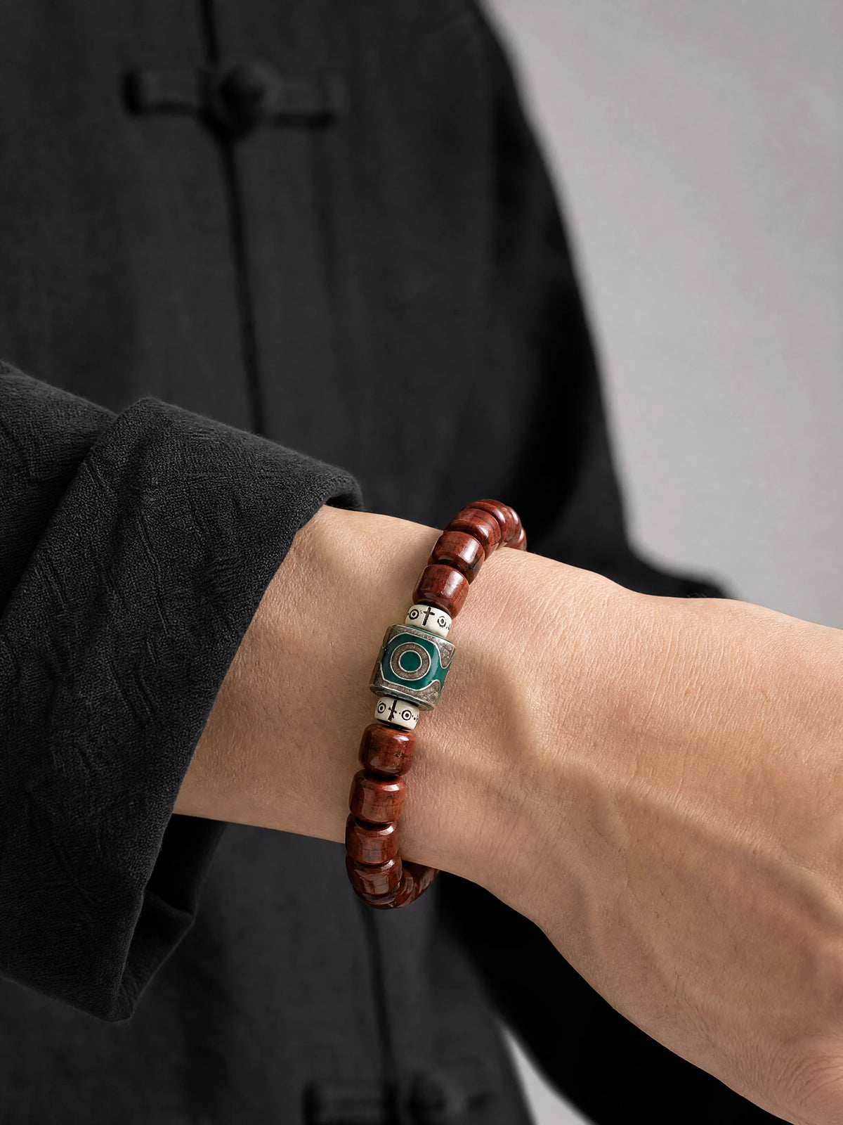 yak-bone-green-dzi-bracelet-protection-model-a-outfit-a-closeup-01