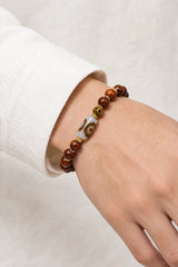 yak-bone-three-eye-dzi-bracelet-10mm-model-a-outfit-a-closeup-01