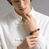 yak-bone-three-eye-dzi-bracelet-10mm-model-a-outfit-a-fashion-02