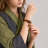 yak-bone-turning-fortune-charm-bracelet-model-b-outfit-b-fashion-03