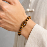 yellow-tiger-eye-pixiu-bracelet-model-a-outfit-a-closeup-01