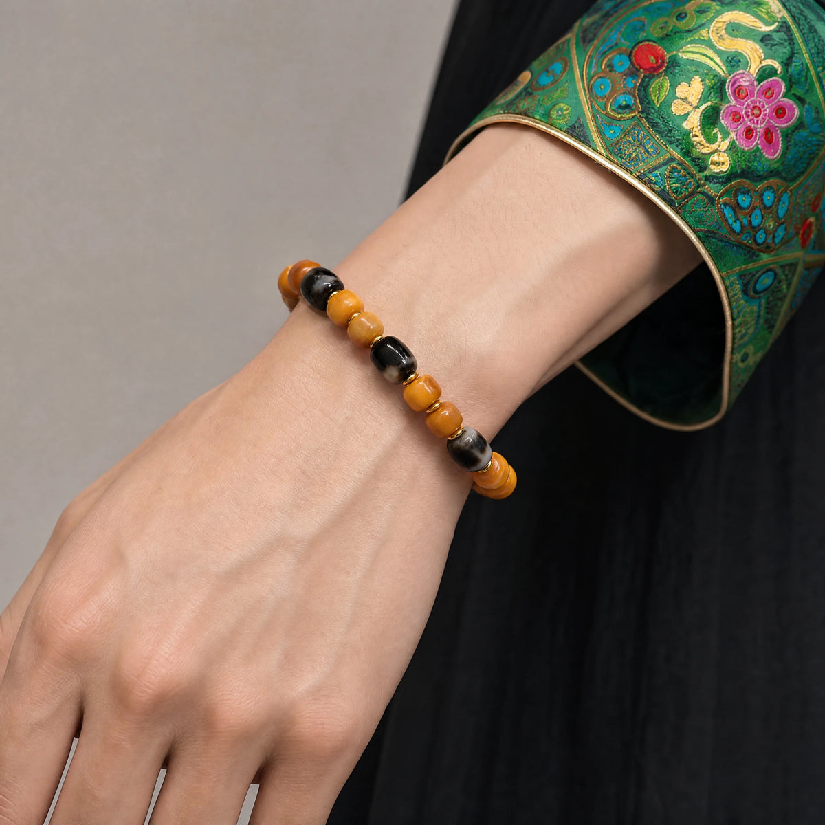 yellow-yak-bone-three-eye-dzi-bracelet-9mm-model-a-outfit-a-fashion-03