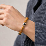yellow-yak-bone-tiger-tooth-dzi-bracelet-12mm-model-a-outfit-a-closeup-01