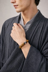 yellow-yak-bone-tiger-tooth-dzi-bracelet-12mm-model-a-outfit-a-fashion-01
